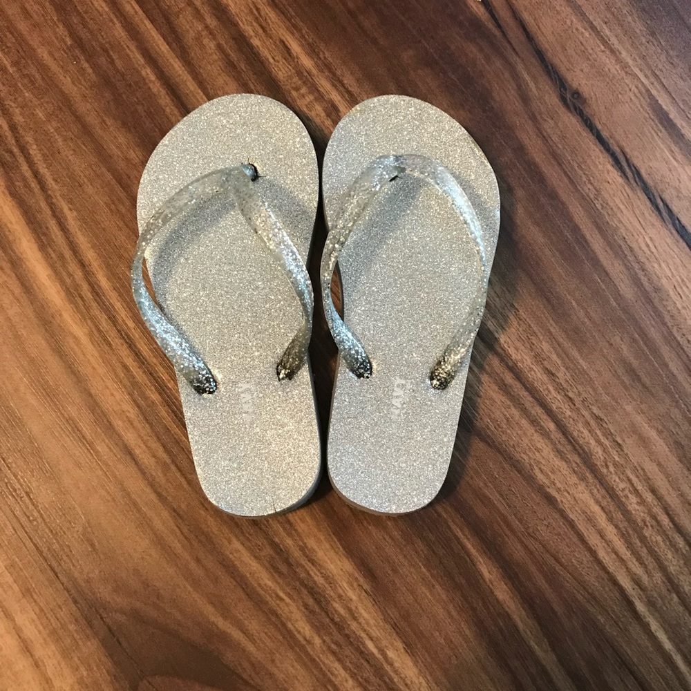Bundle of five pairs of flip flops size 10/11